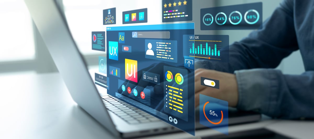 Designer working on web and app interface design on a large screen